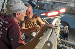 Les Parker and Dave working on wiring
