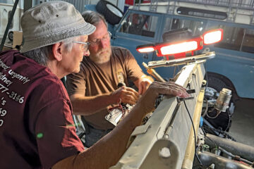 Les Parker and Dave working on wiring